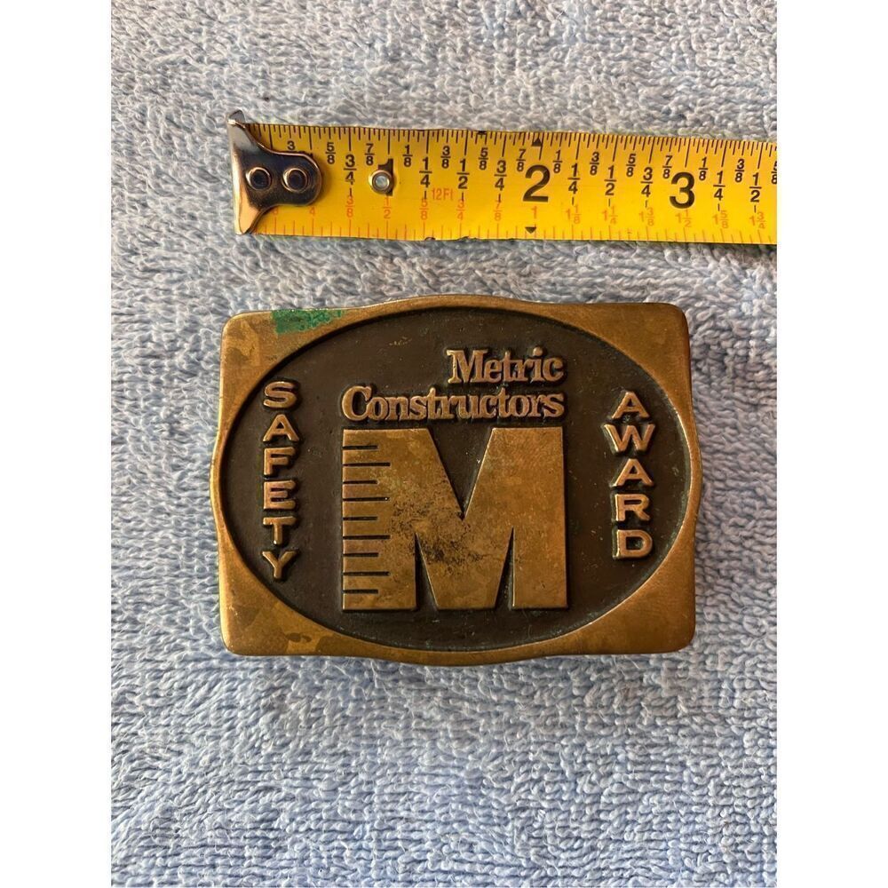 Vintage Metric Constructors Belt Buckle